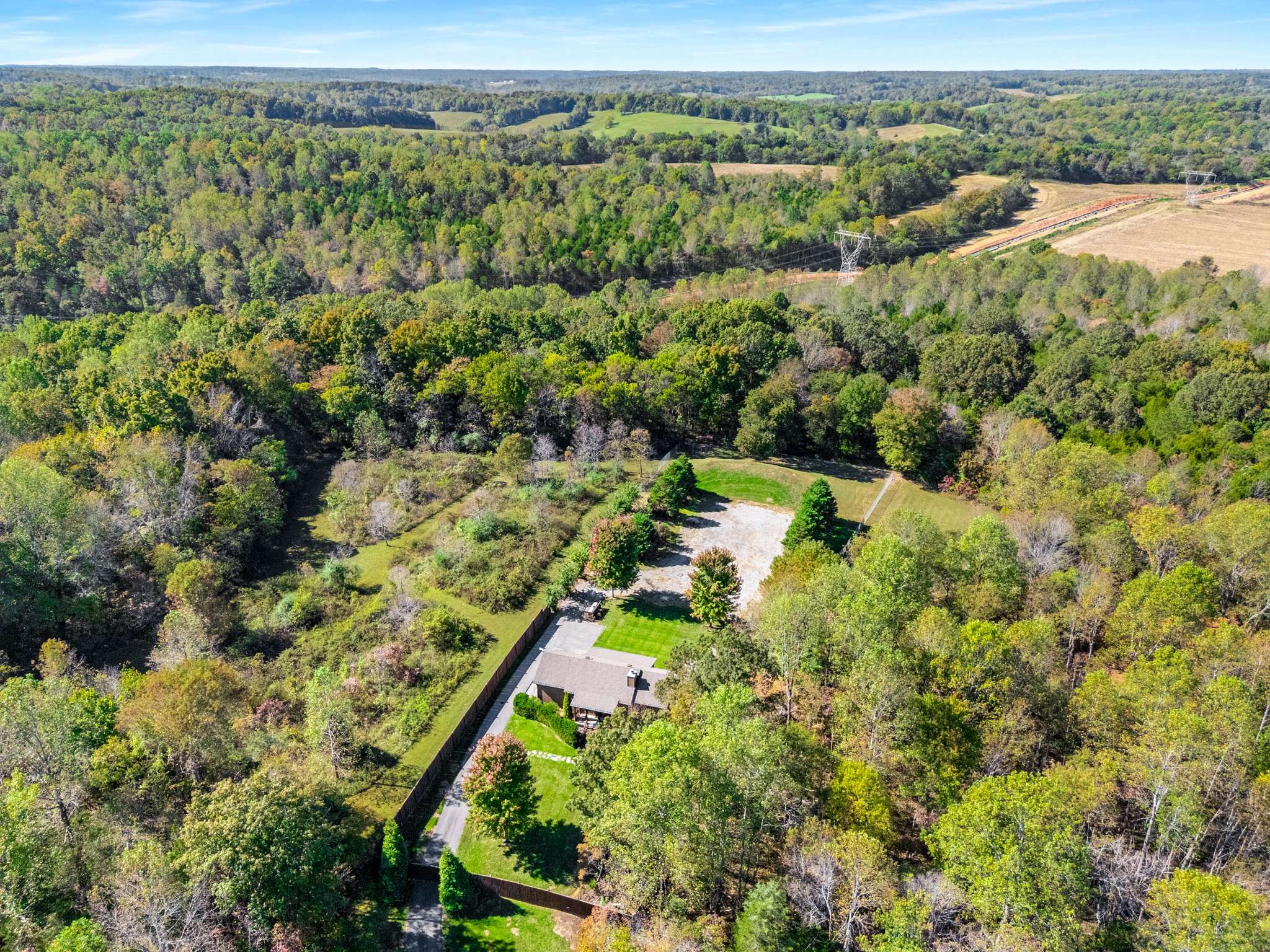 1257 Harris Hollow Road Charlotte, TN 37036 - Photo 51 of 53 an aerial view of residential houses with outdoor space and trees