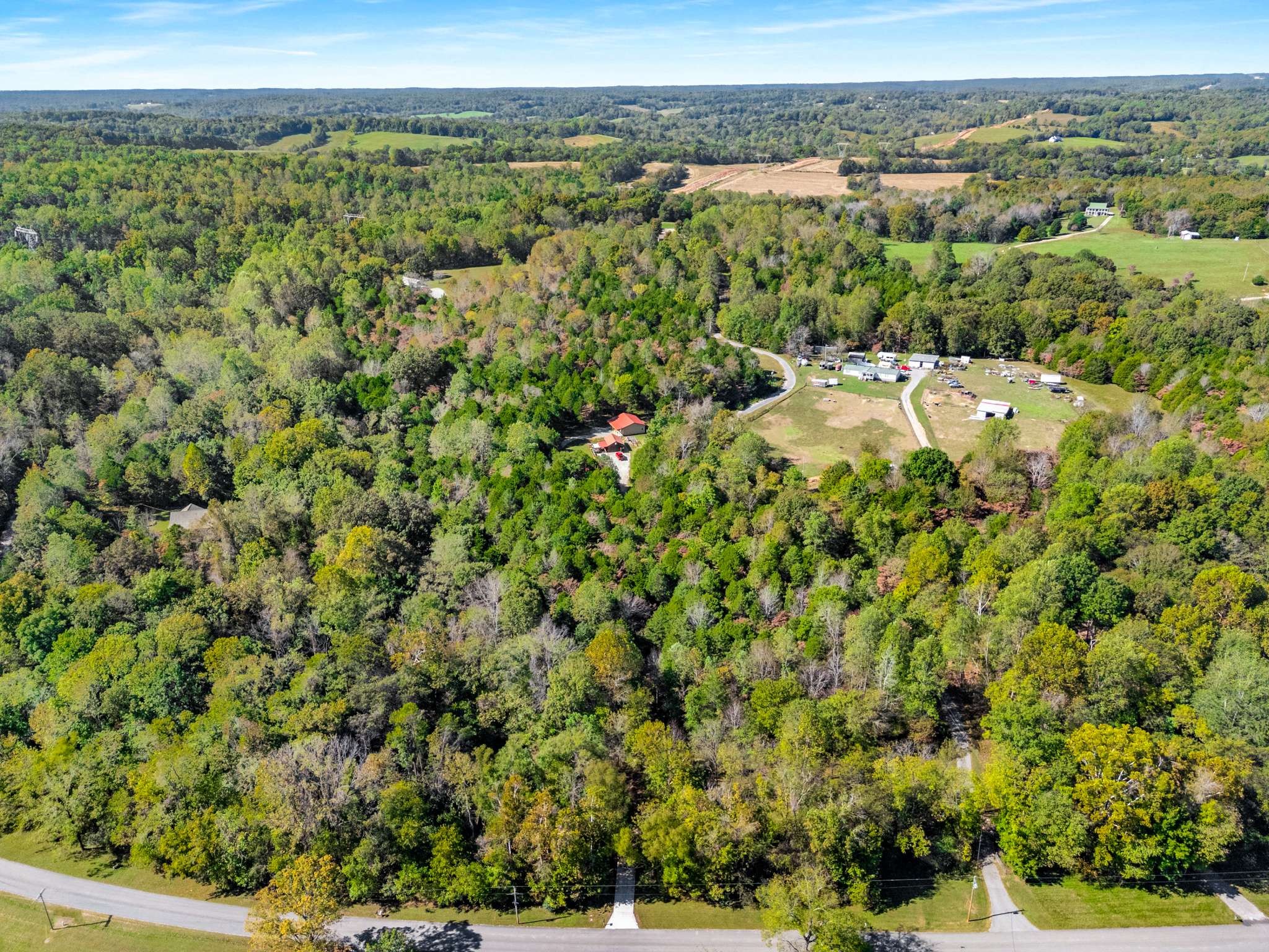 1257 Harris Hollow Road Charlotte, TN 37036 - Photo 52 of 53 an aerial view of a houses with a yard
