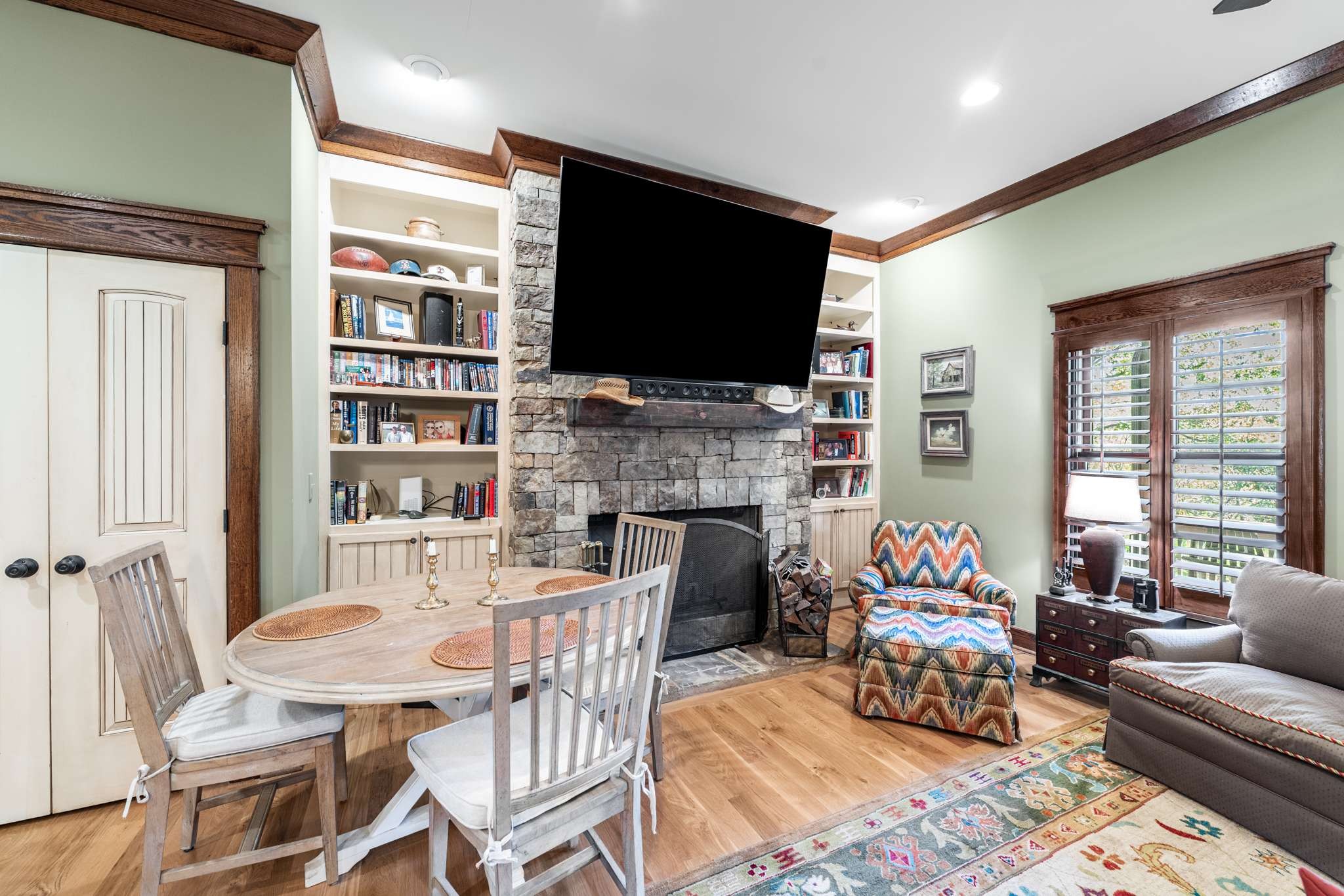 1257 Harris Hollow Road Charlotte, TN 37036 - Photo 9 of 53 a living room with fireplace furniture and a flat screen tv