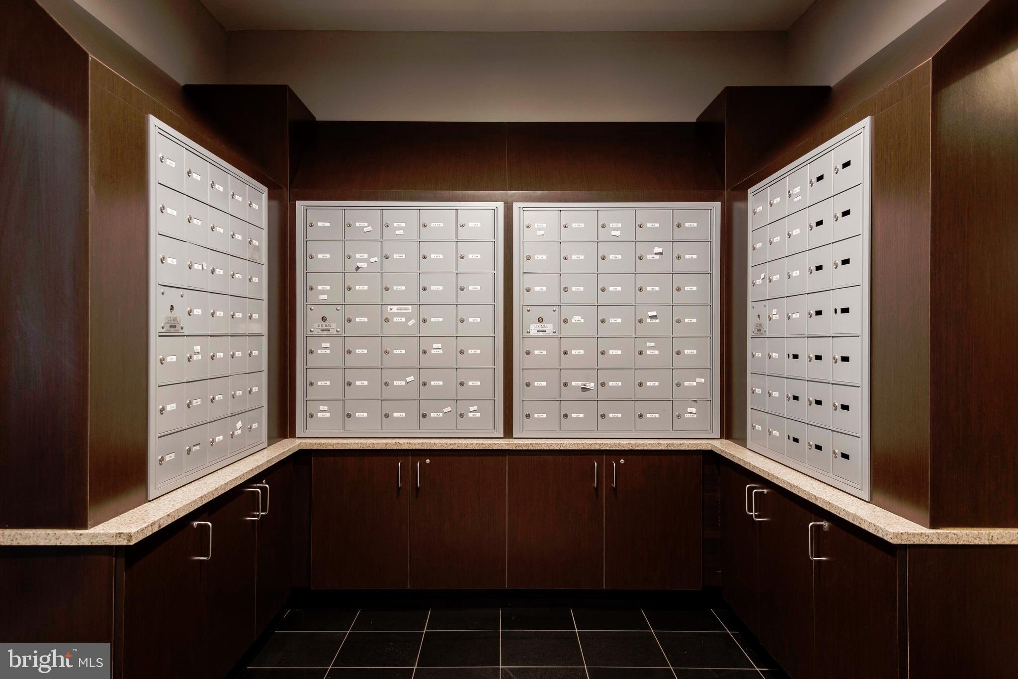 2100-2 Walnut Street, Unit 14G Philadelphia, PA 19103 - Photo 8 of 38 a view of a kitchen with a window