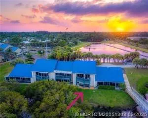 a view of a building with a garden