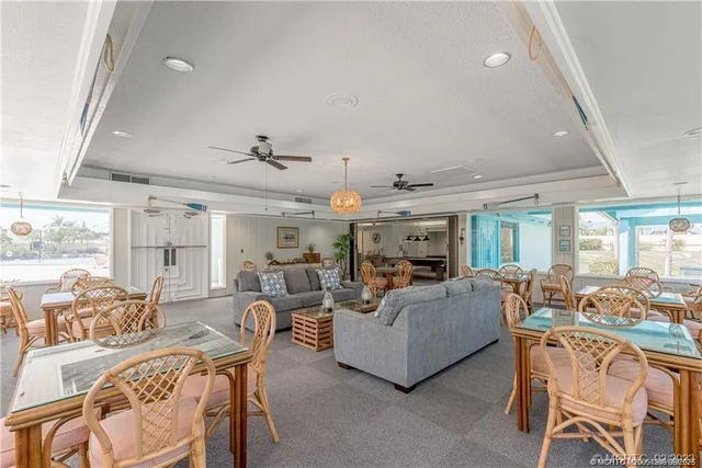 an aerial view of a house with a swimming pool