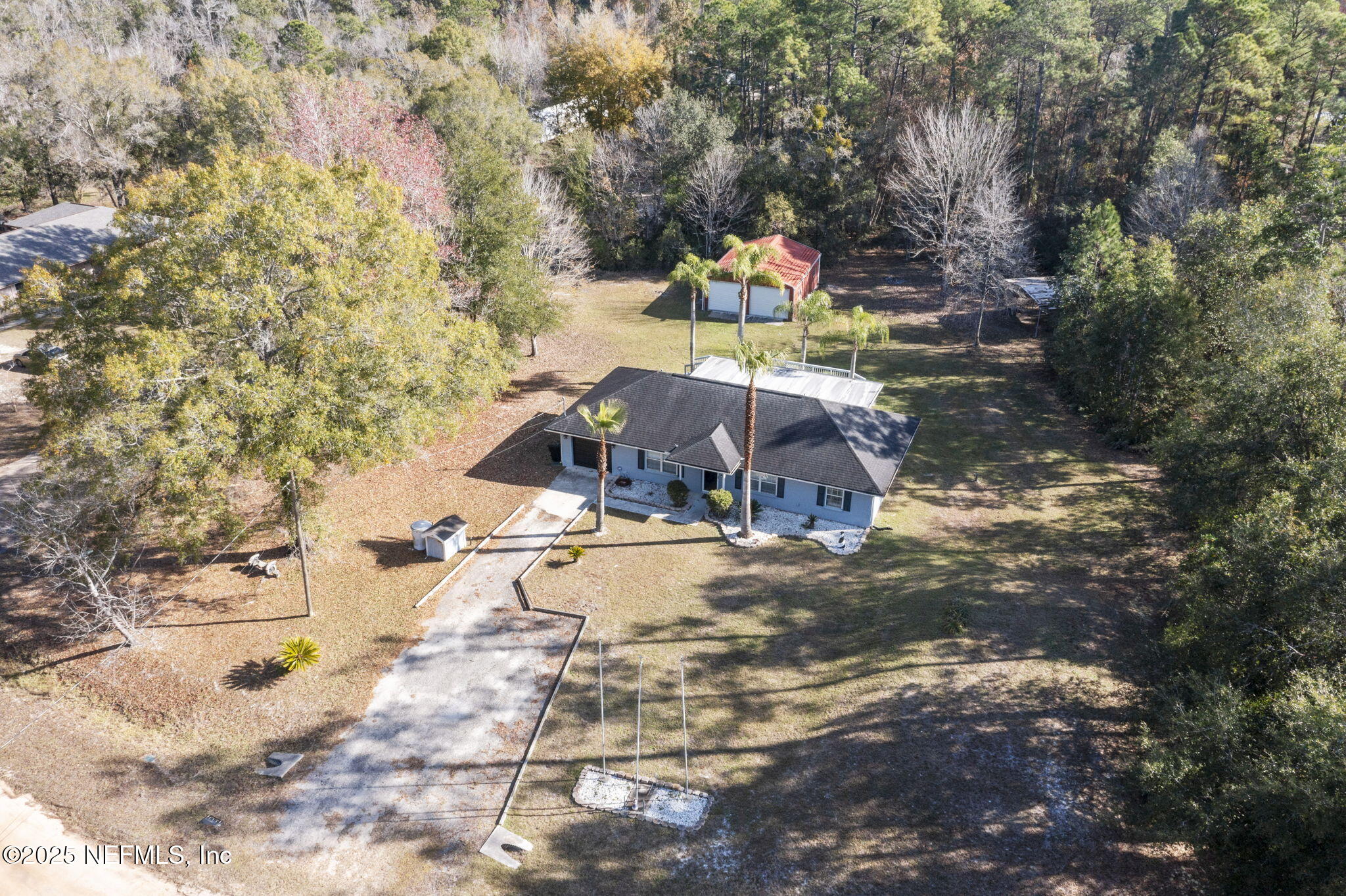 26 Bullrush Court Middleburg, FL 32068 - Photo 39 of 43 a view of a house with a yard