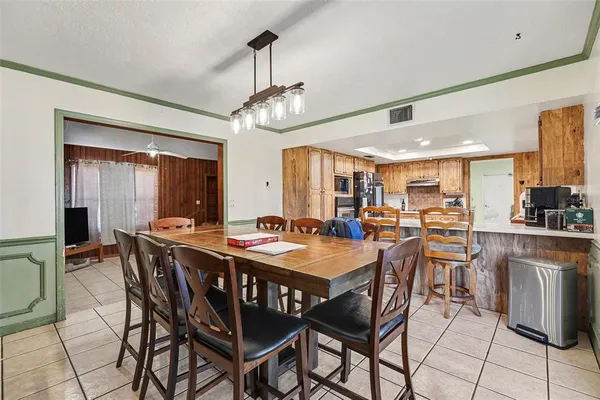 a view of a dining room with furniture