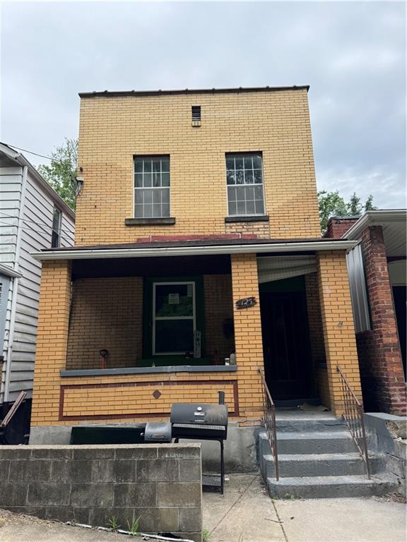 125 Frazier Avenue McKees Rocks, PA 15136 - Photo 2 of 13 a outdoor view of a house with windows