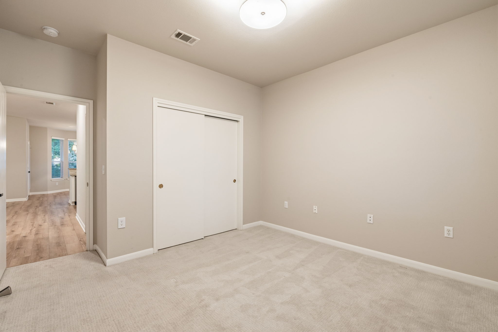137 Trail Rider Way Georgetown, TX 78633 - Photo 18 of 29 Comfortable carpet flooring creates a serene atmosphere in this versatile room.