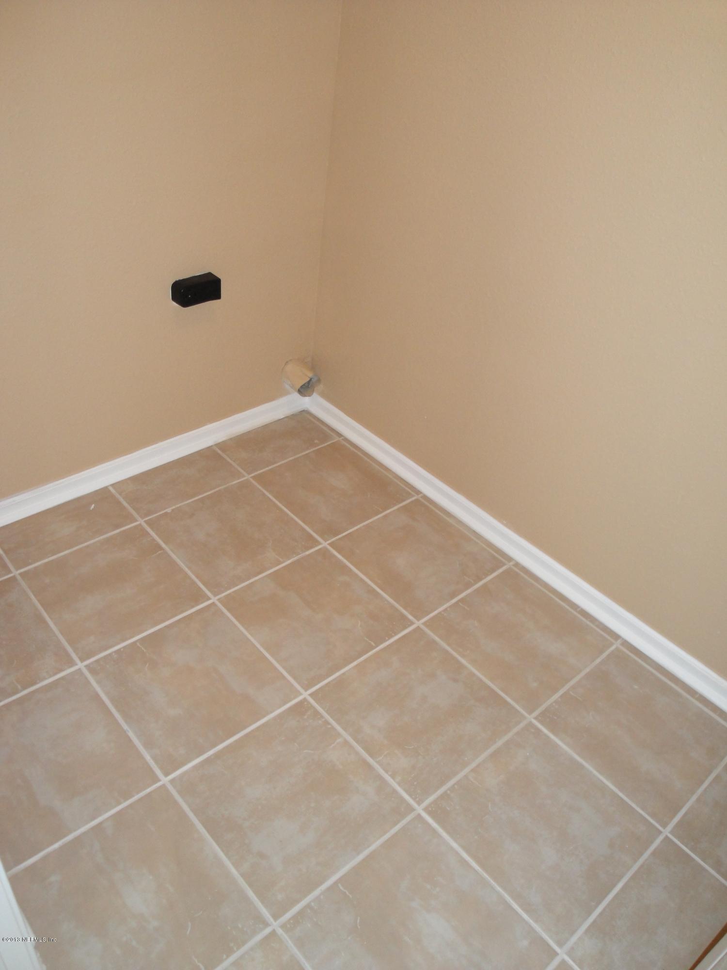 7266 South Rampart Ridge Jacksonville, FL 32244 - Photo 12 of 22 a view of a room with rack on the wall
