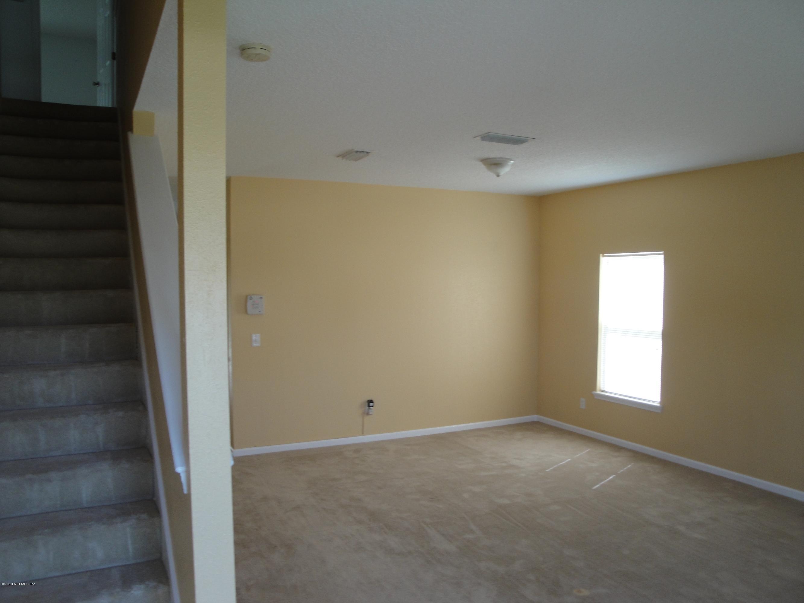 7266 South Rampart Ridge Jacksonville, FL 32244 - Photo 22 of 22 a view of an empty room with a window