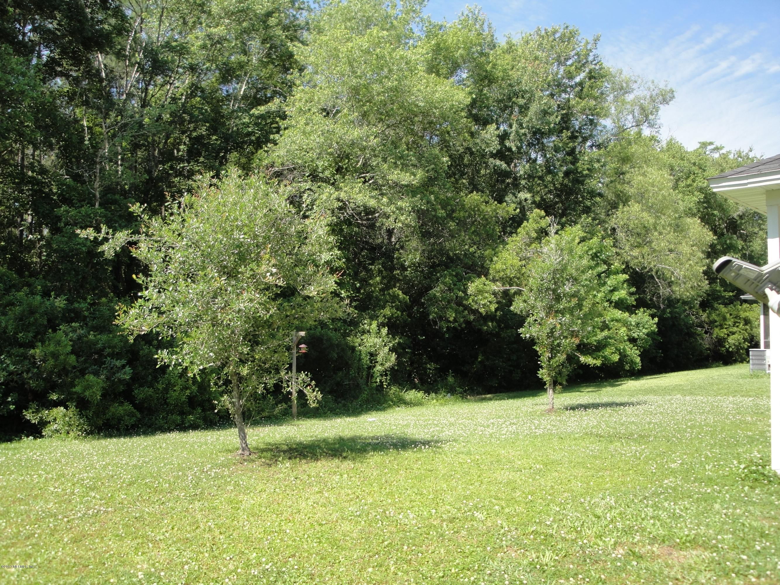 7266 South Rampart Ridge Jacksonville, FL 32244 - Photo 5 of 22 a view of an outdoor space and a yard