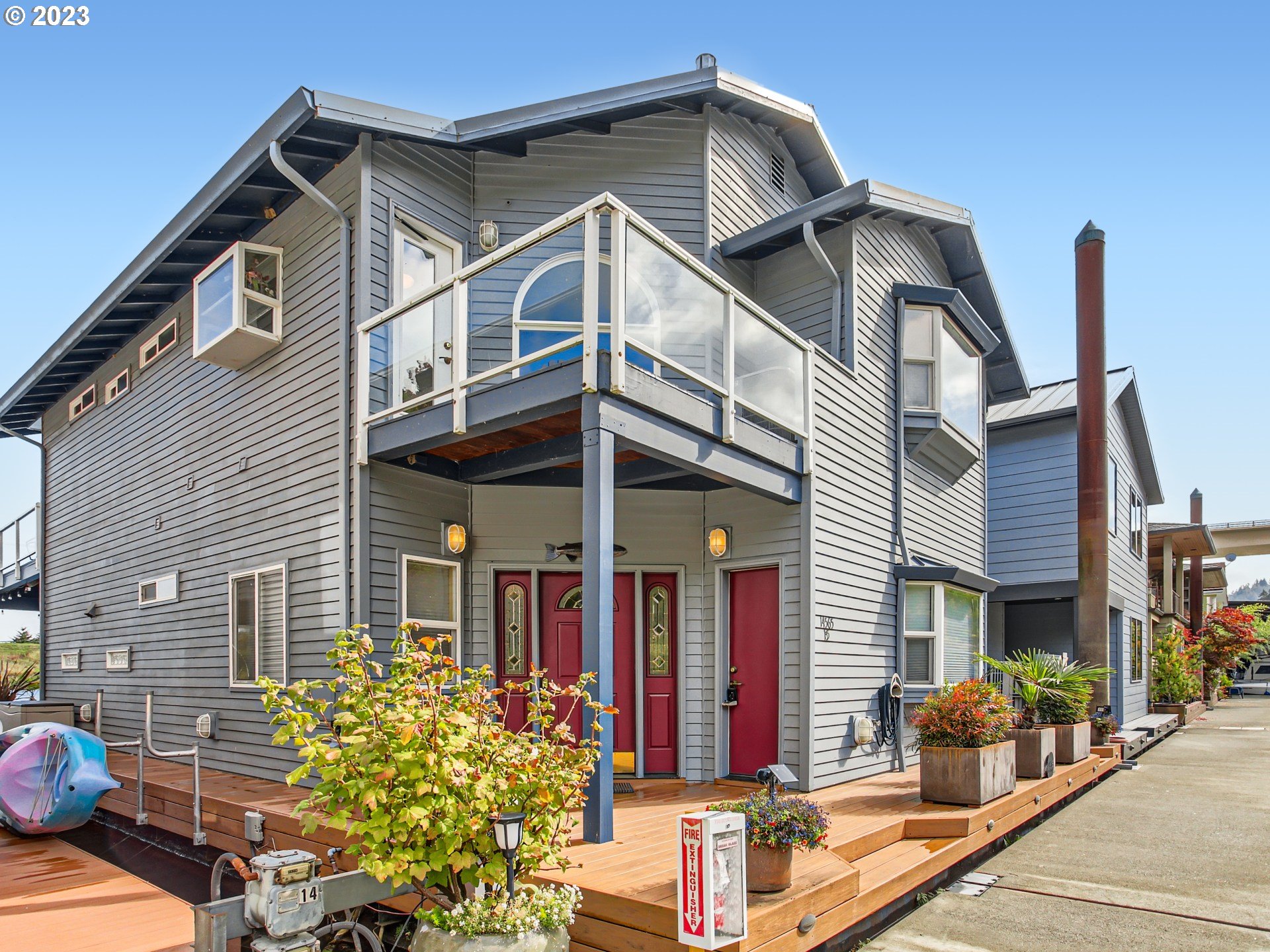 14565 Northwest Larson Road, Unit 15 Portland, OR 97231 - Photo 1 of 27 a front view of a house with garden