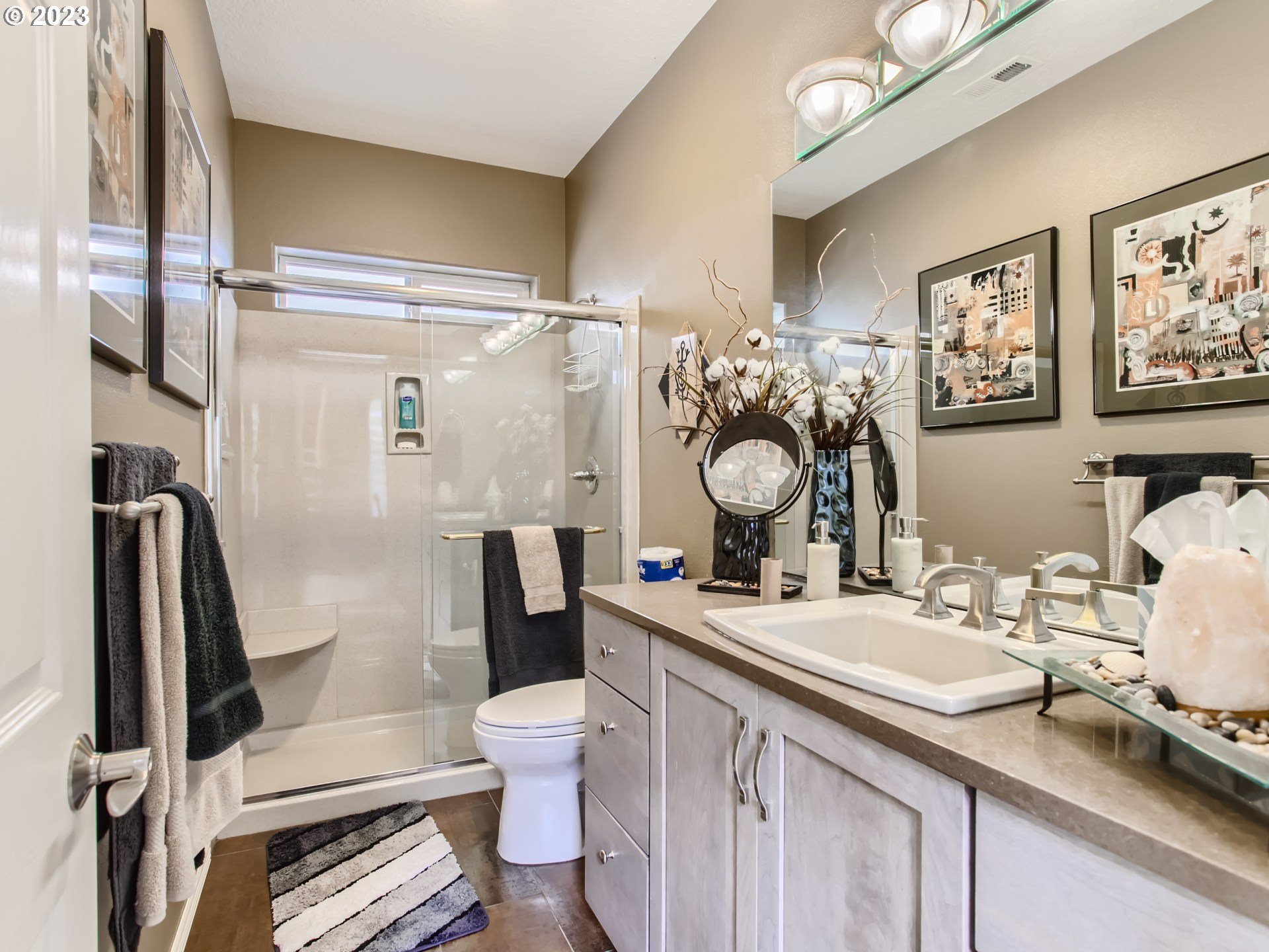 14565 Northwest Larson Road, Unit 15 Portland, OR 97231 - Photo 13 of 27 a bathroom with a sink toilet and shower