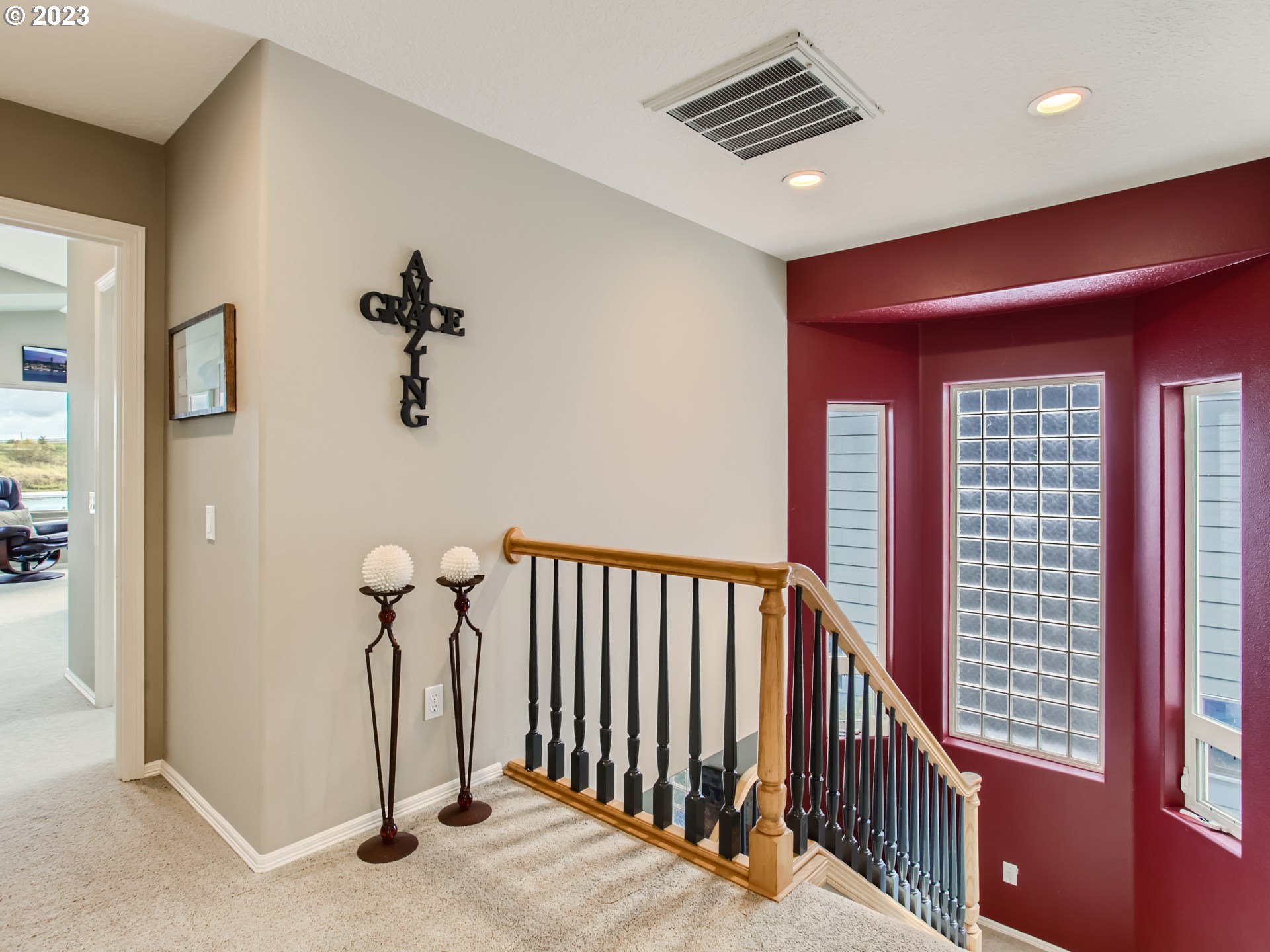 14565 Northwest Larson Road, Unit 15 Portland, OR 97231 - Photo 21 of 27 a view of a hallway with a dining room and stairs