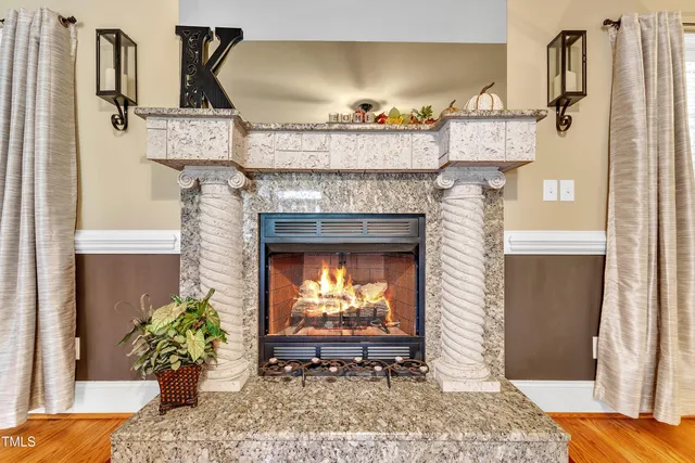 a bathroom with a tub a sink and a mirror