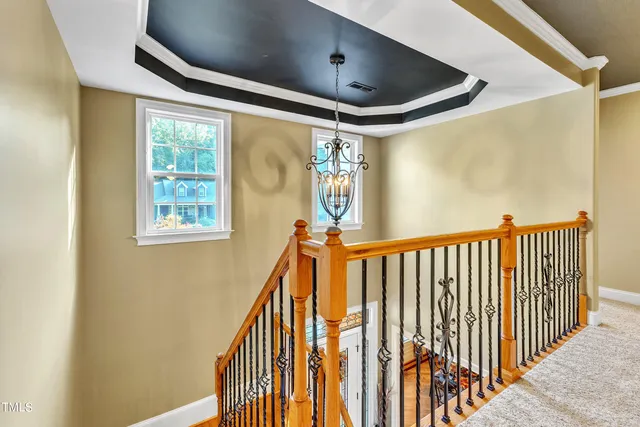 a view of a balcony with wooden floor