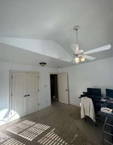 a view of a house with backyard