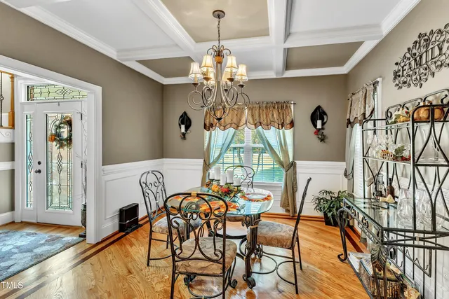 a kitchen with stainless steel appliances granite countertop a refrigerator a stove top oven a sink and dishwasher