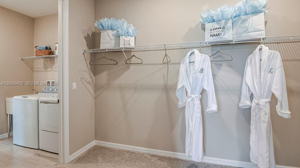 657 Southeast Ranch Oak Circle Port St. Lucie, FL 34984 - Photo 19 of 43 a bathroom with a shower