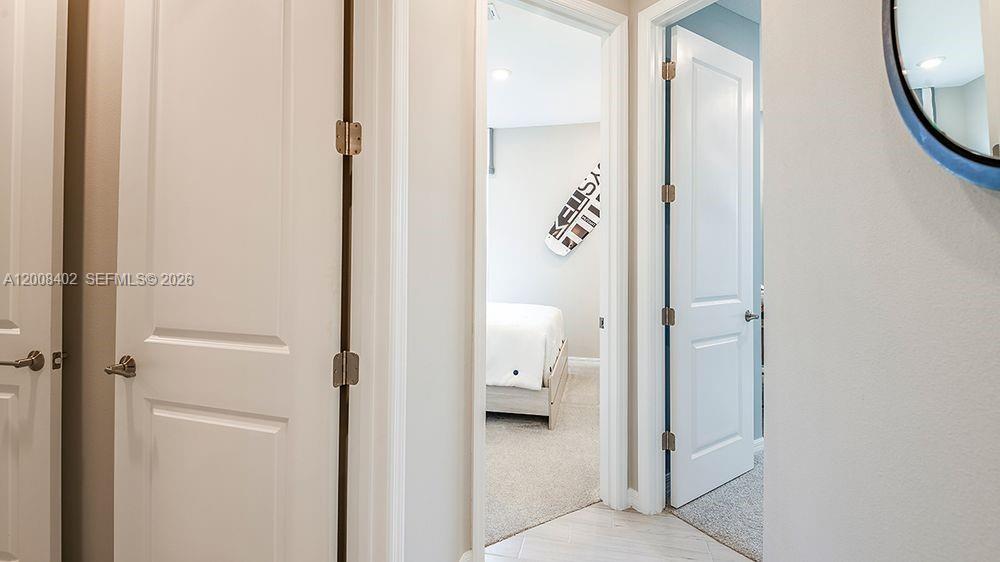 657 Southeast Ranch Oak Circle Port St. Lucie, FL 34984 - Photo 22 of 43 a view of a bathroom from a bathroom
