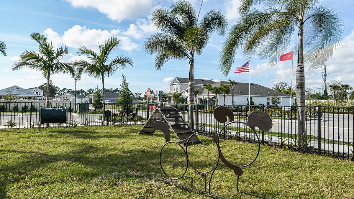 657 Southeast Ranch Oak Circle Port St. Lucie, FL 34984 - Photo 43 of 43 a view of swimming pool and patio