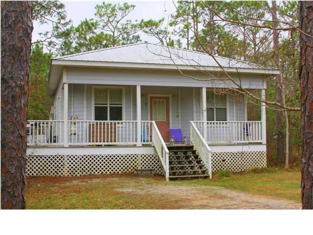 312 East Nursery Road Santa Rosa Beach, FL 32459 - Photo 2 of 3 a view of a house with a door