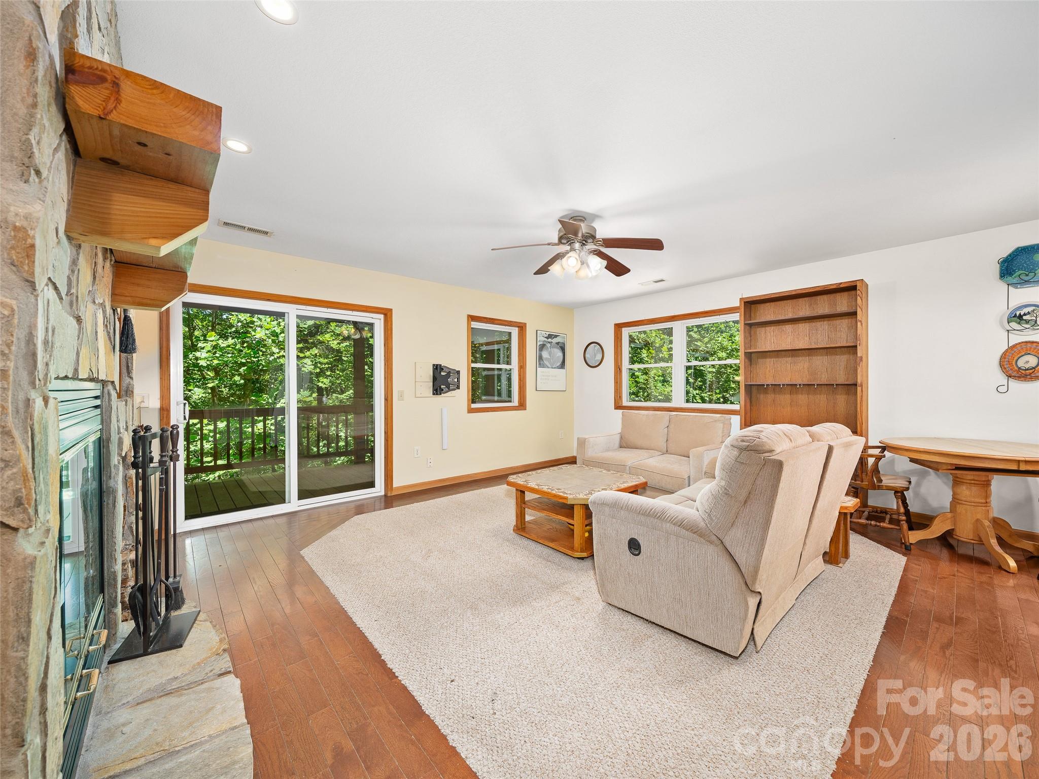 142 Wildflower Road Spruce Pine, NC 28777 - Photo 5 of 46 a living room with furniture and a window