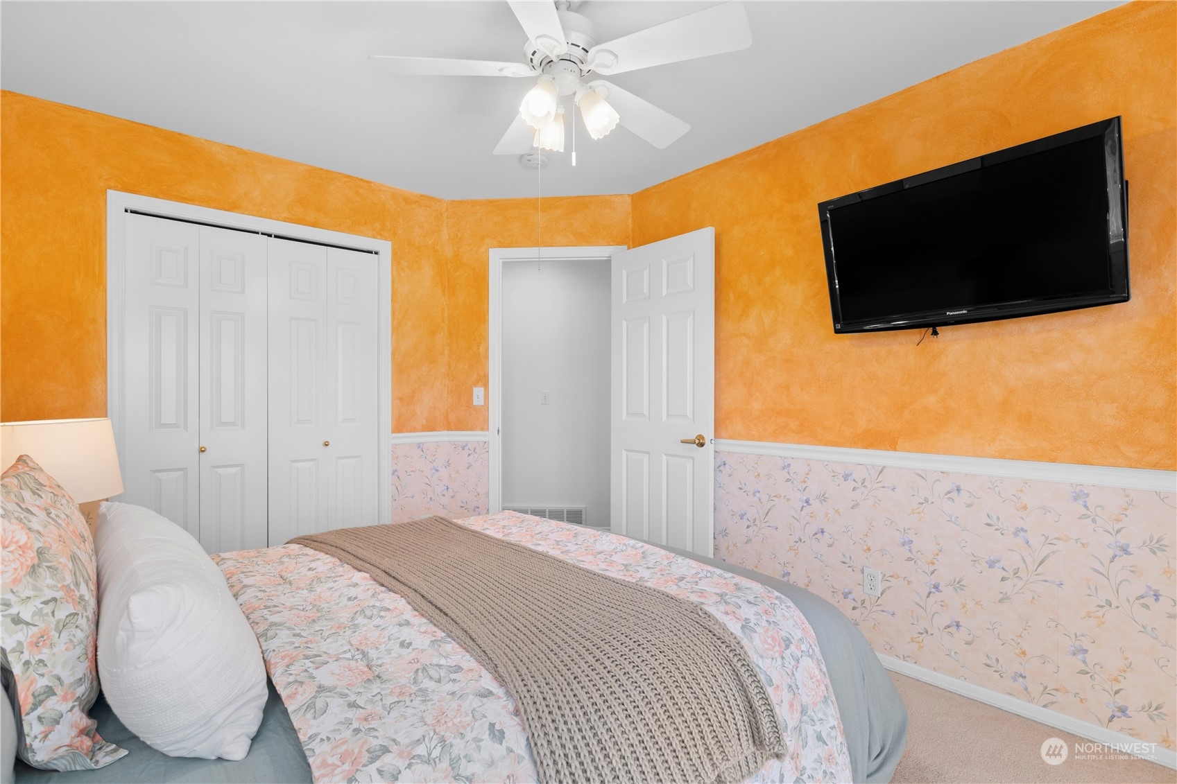 1431 241st Street Southeast Bothell, WA 98021 - Photo 27 of 40 a bedroom with a bed and a flat screen tv