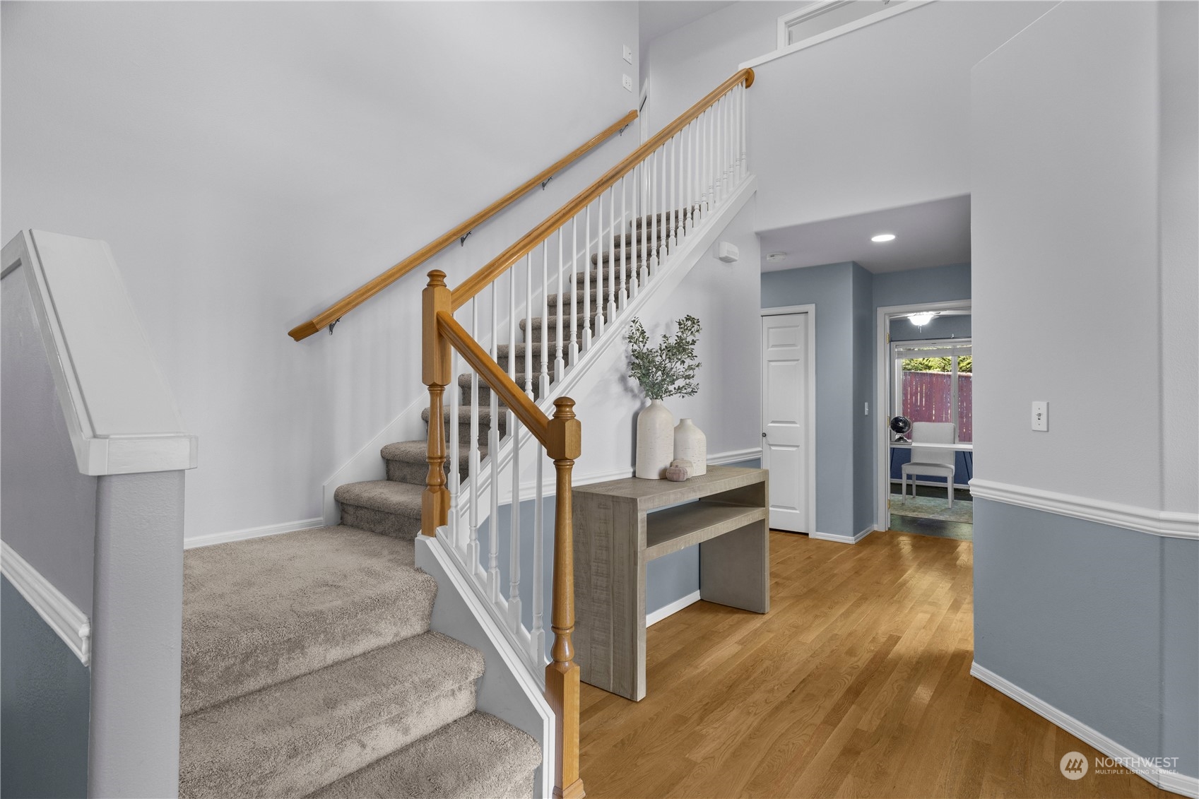 1431 241st Street Southeast Bothell, WA 98021 - Photo 5 of 40 a view of entryway and hall with wooden floor