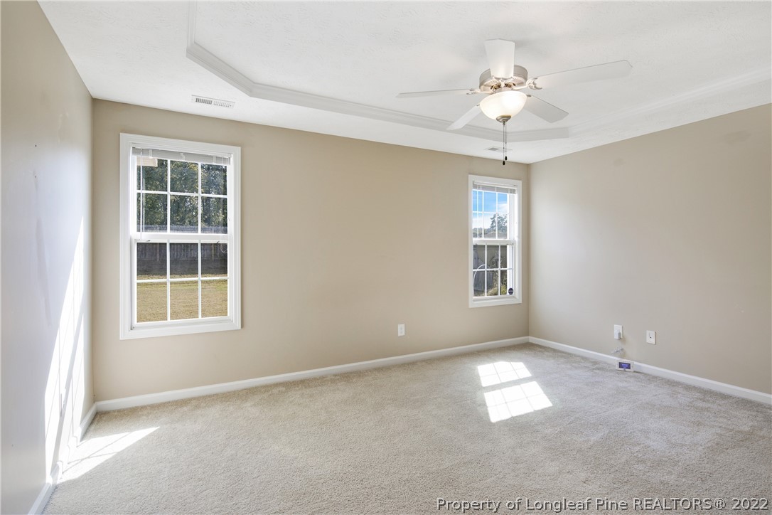 654 Hogart Street Raeford, NC 28376 - Photo 21 of 35 a view of an empty room with a window