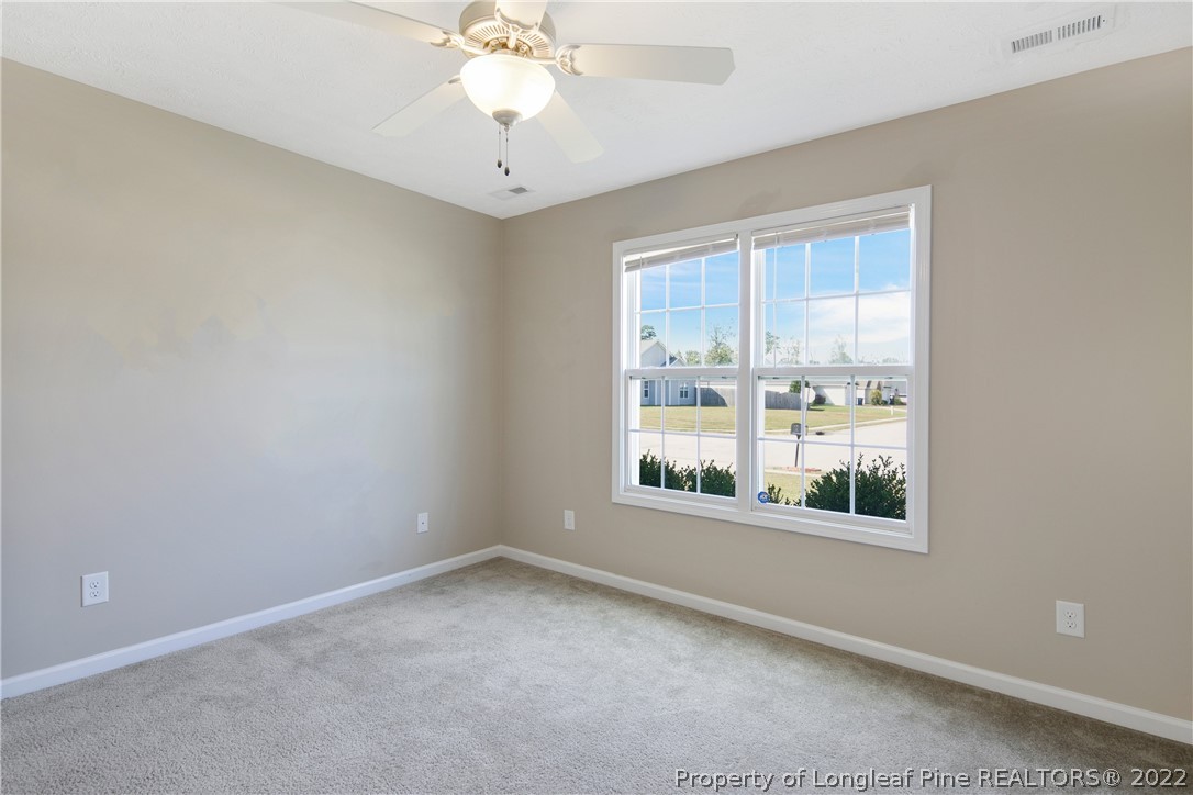 654 Hogart Street Raeford, NC 28376 - Photo 29 of 35 an empty room with a window