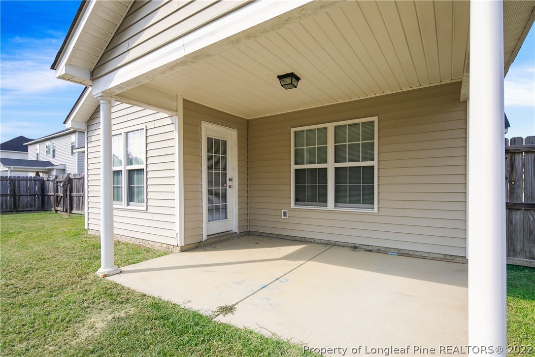 654 Hogart Street Raeford, NC 28376 - Photo 35 of 35 a view of house with backyard