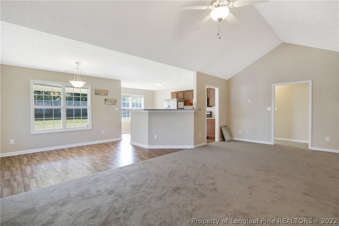 654 Hogart Street Raeford, NC 28376 - Photo 9 of 35 a view of an empty room with a window