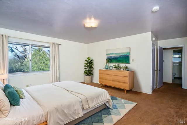 wooden floor in an empty room with a fireplace