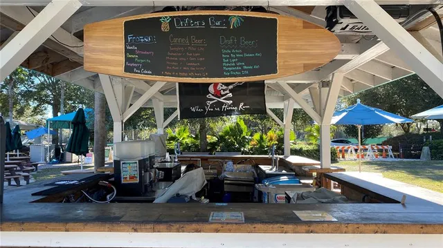 a view of a chairs and table in the patio