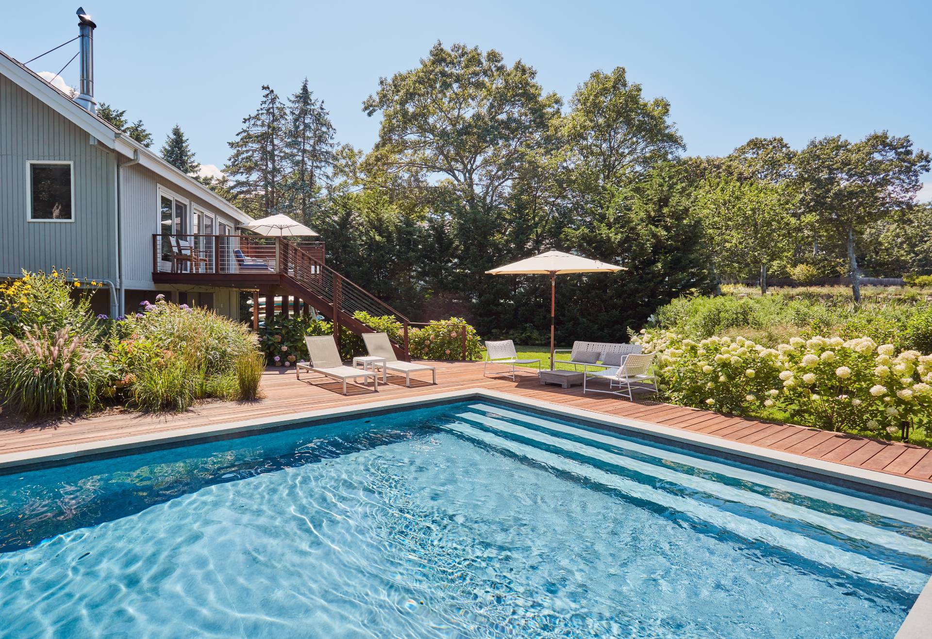 6 Bay Inlet Road East Hampton, NY 11937 - Photo 12 of 50 a view of a house with backyard and sitting area