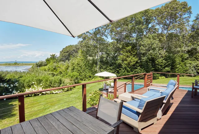 a view of deck with furniture and outdoor seating