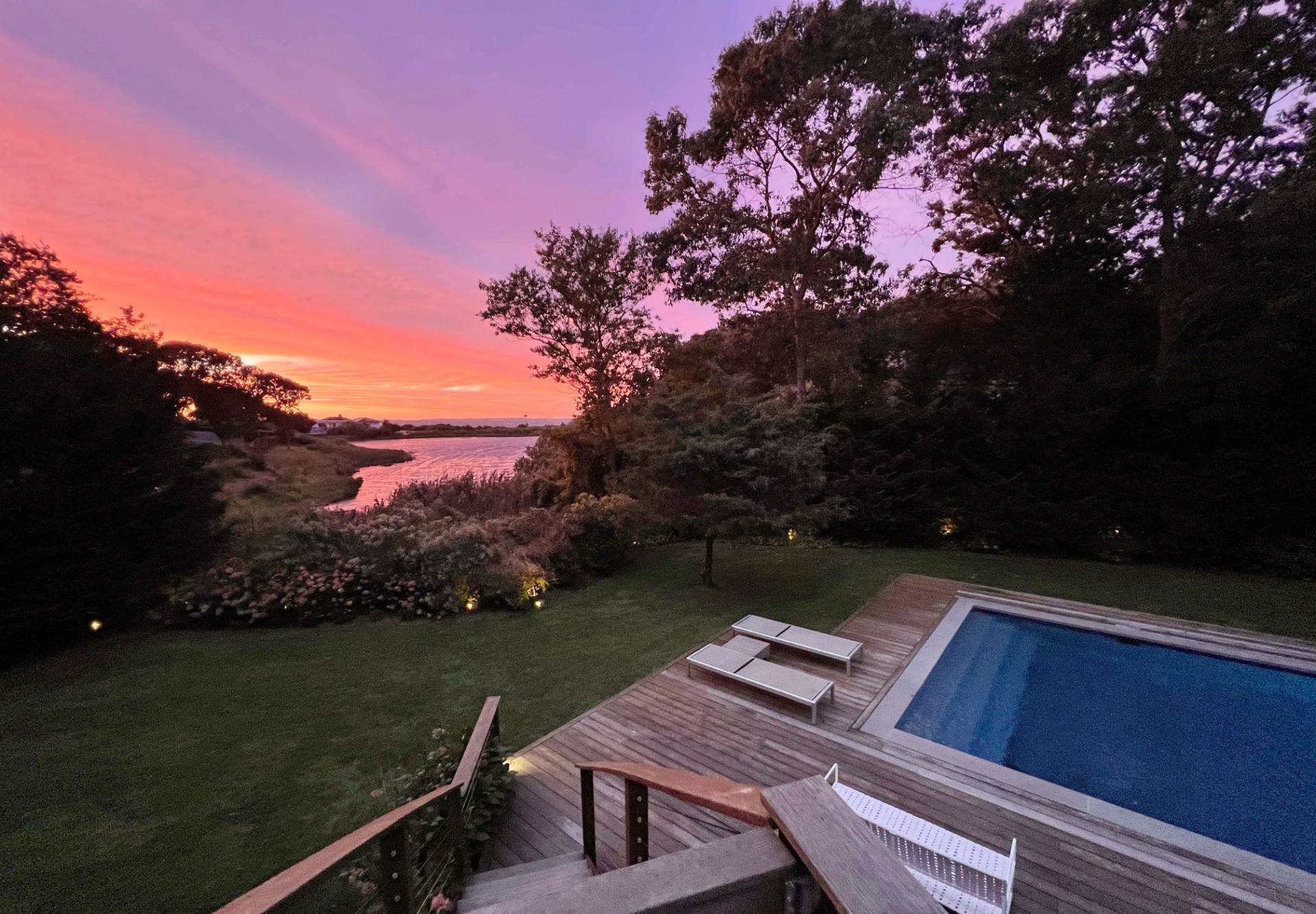 6 Bay Inlet Road East Hampton, NY 11937 - Photo 20 of 50 a view of a wooden deck and lake view