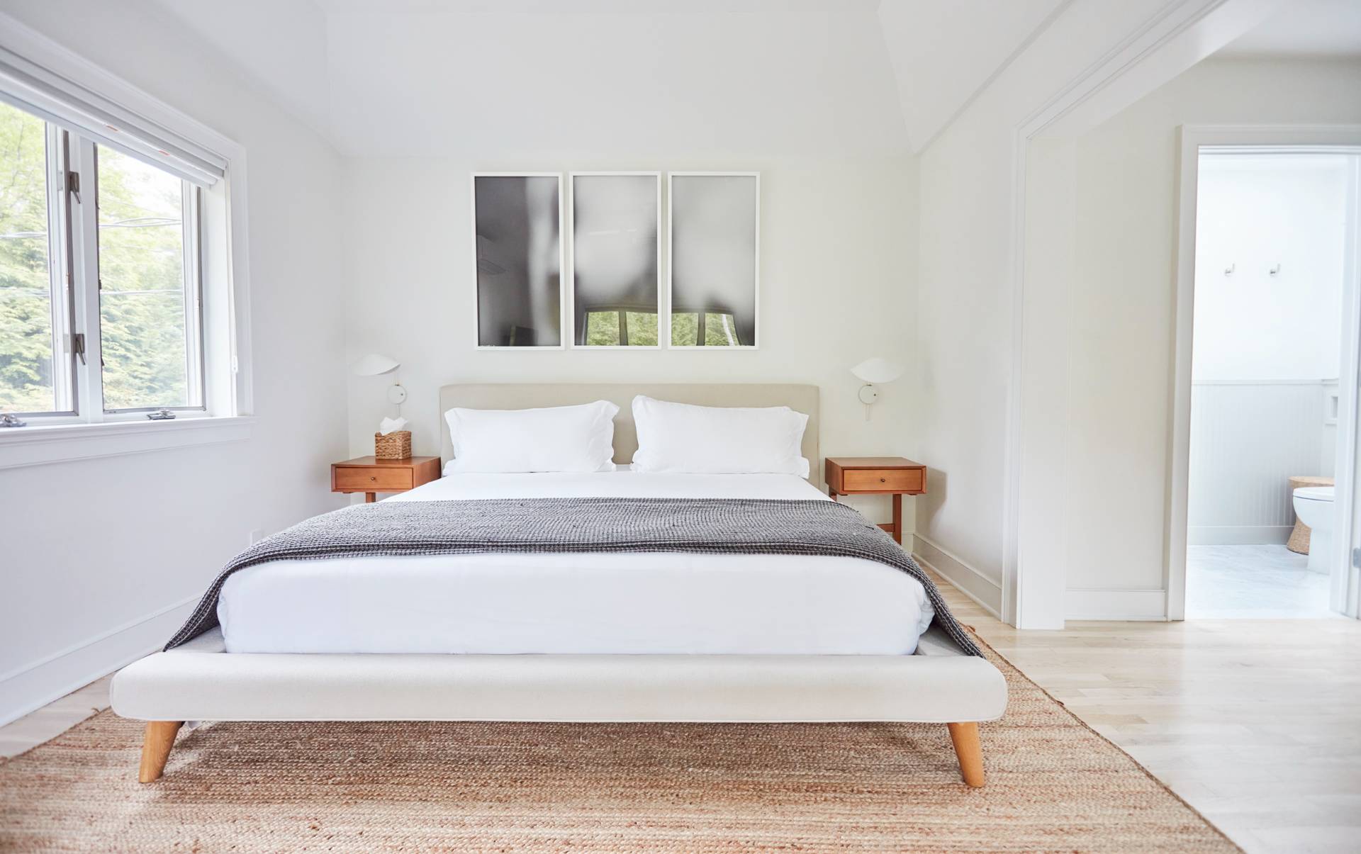 6 Bay Inlet Road East Hampton, NY 11937 - Photo 29 of 50 a bathroom with a bathtub and window