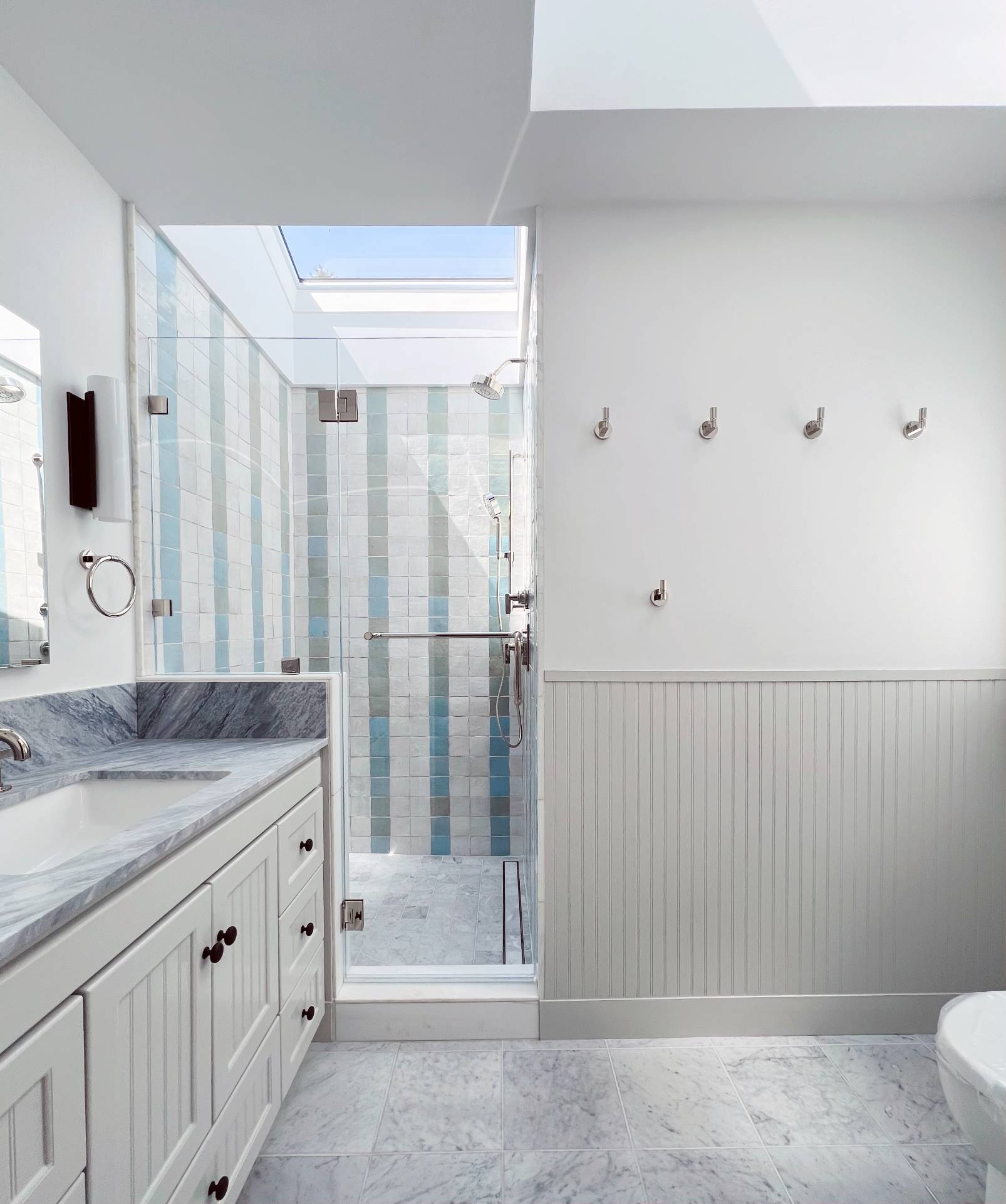 6 Bay Inlet Road East Hampton, NY 11937 - Photo 30 of 50 a bathroom with a granite countertop sink and a mirror