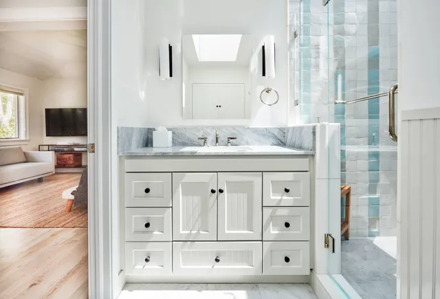 a living room with furniture window and flat screen tv