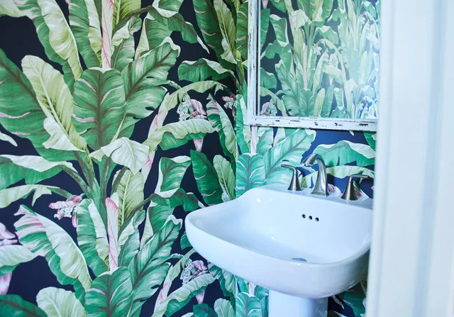 a view of a car parked in front of a house