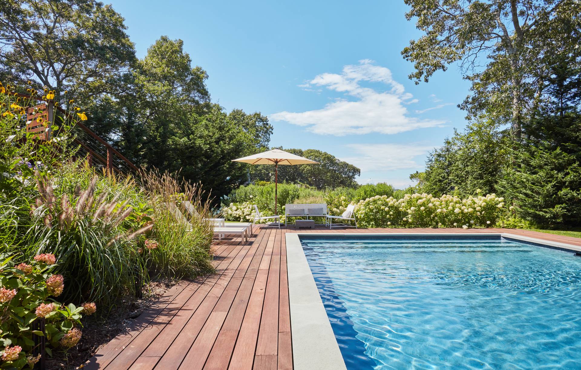 6 Bay Inlet Road East Hampton, NY 11937 - Photo 10 of 50 a view of a balcony with wooden floor and an outdoor space