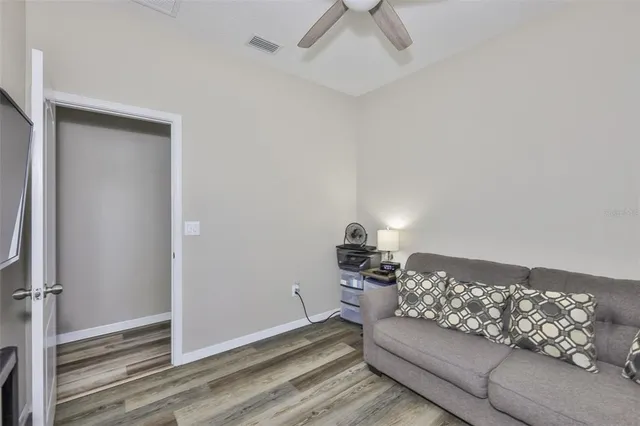 a bathroom with a double vanity sink mirror and bathtub