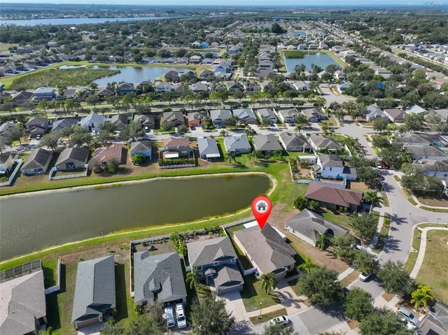 a porch with a table and chairs