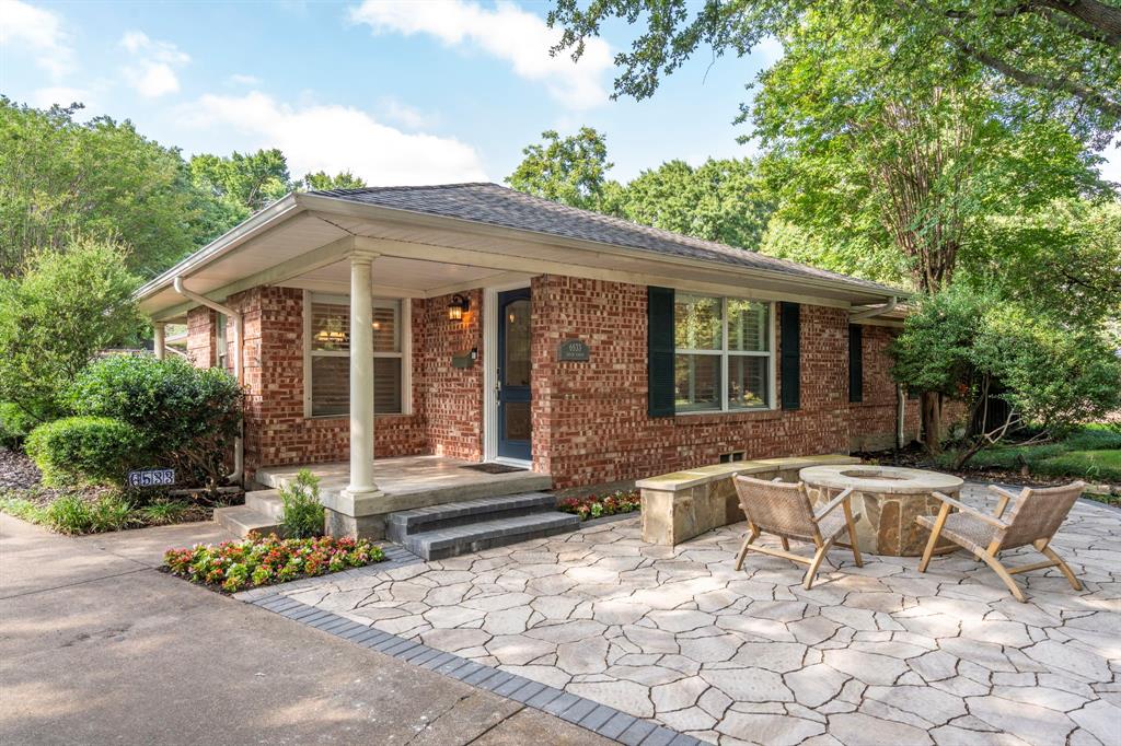 6533 Axton Circle Dallas, TX 75214 - Photo 1 of 1 a front view of a house with garden