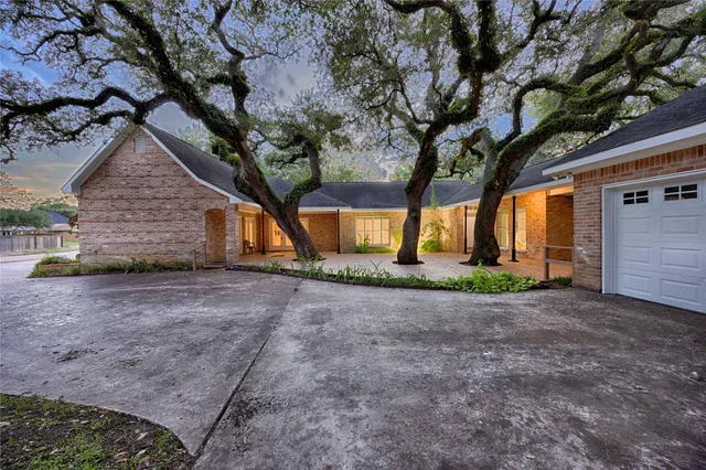 a view of a house with a tree