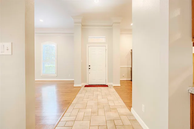 a view of a room with a white walls