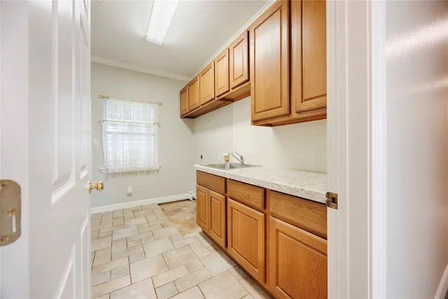 a bathroom with a sink a toilet and a bathtub
