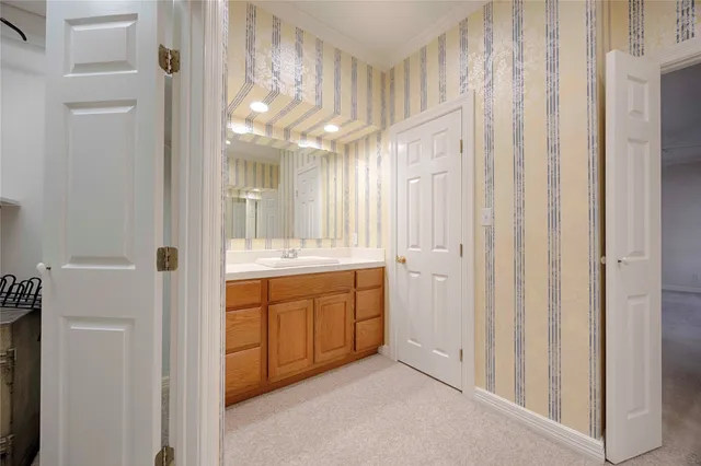 a bathroom with a toilet and a shower curtain