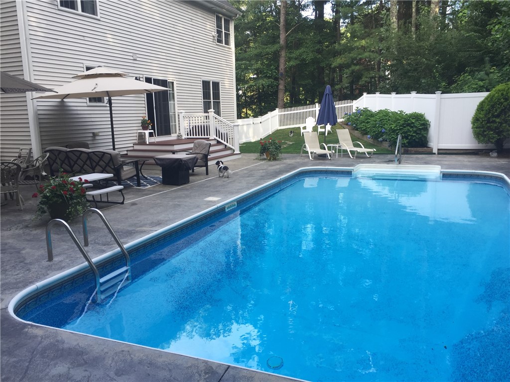 264 Round Top Road Burrillville, RI 02830 - Photo 44 of 49 pool with patio and new vinyl deck, and vinyl fencing