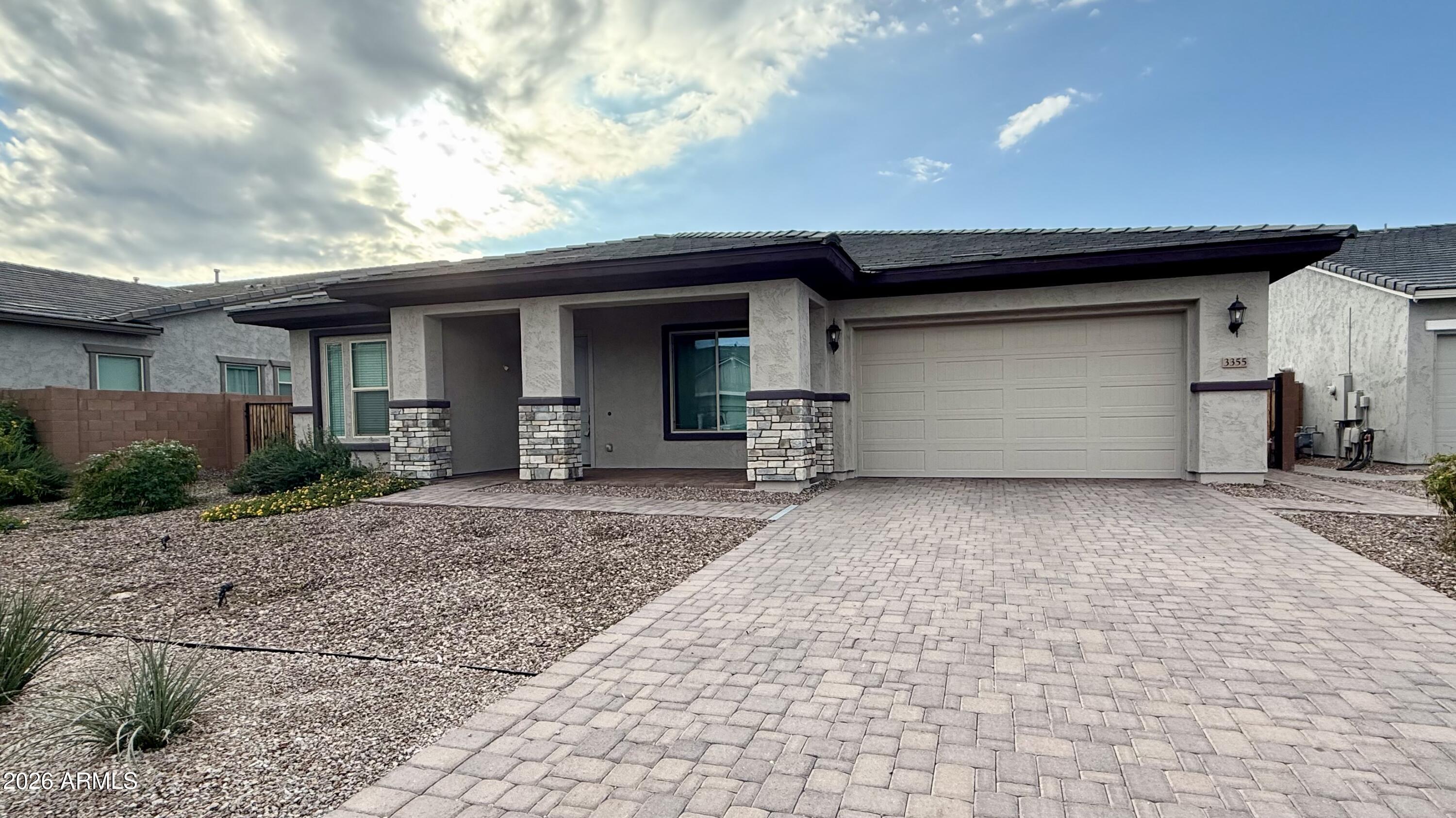 3355 East Constance Way Phoenix, AZ 85042 - Photo 2 of 42 a front view of a house with a yard